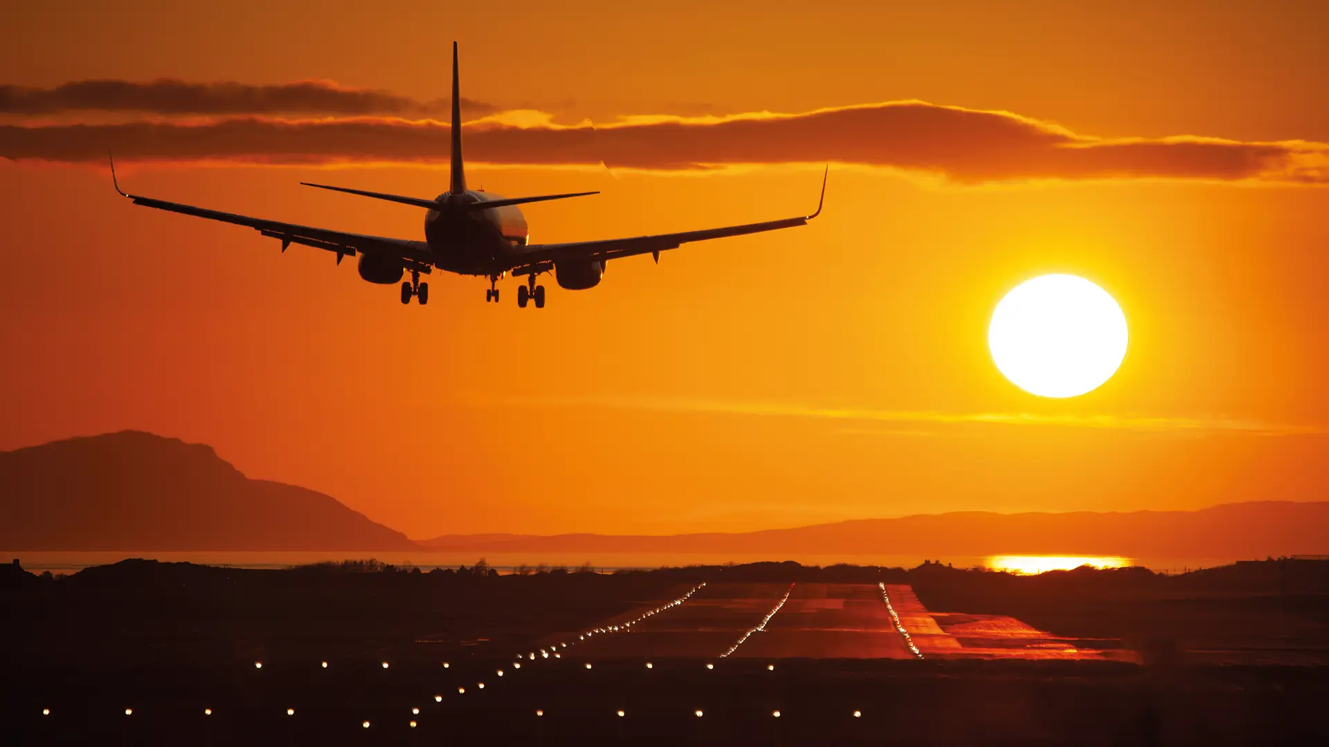 aircraft-landing-at-Prestwick-Airport-with-beautiful-sunset